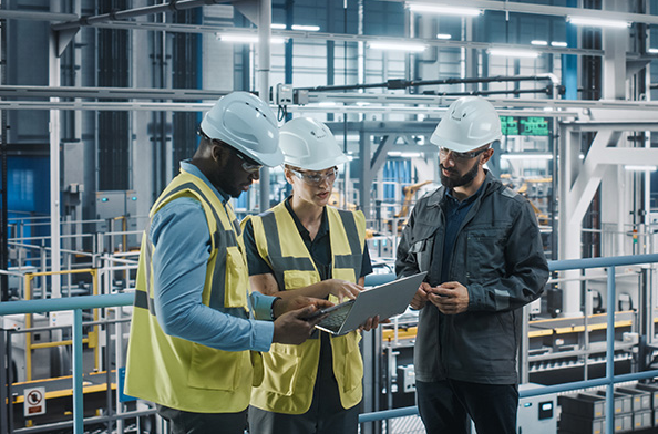 Engineering team reviewing production systems